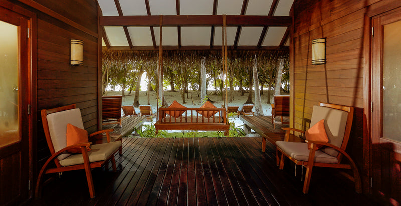 The veranda of a Beach Villa Suite at Medhufushi Island Resort.