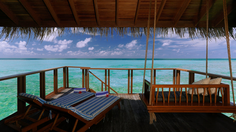 The deck of a Water Villa at Medhufushi Island Resort.