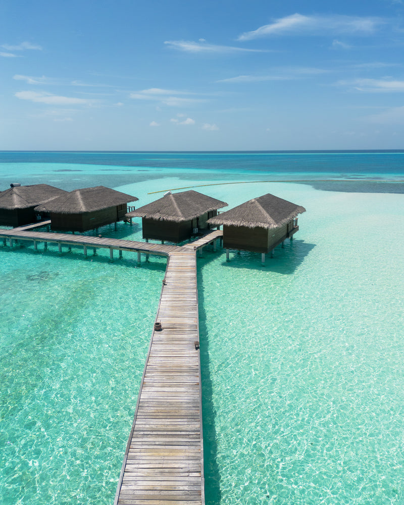 A third view of the Water Villas at Medhufushi Island Resort.