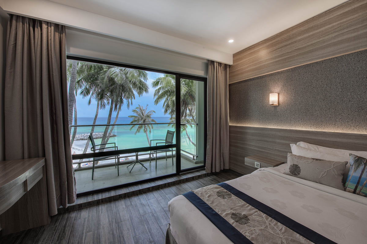 Deluxe double room with a sea-view balcony at Kaani Grand Seaview