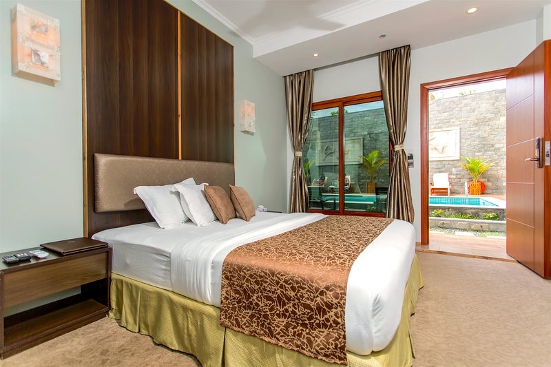 Deluxe double pool-view room at Kaani Village & Spa