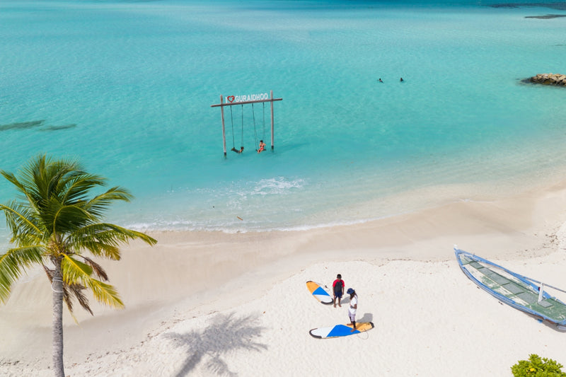 h78 Guraidhoo, South Malé Atoll: a swing standing in the lagoon off the beach