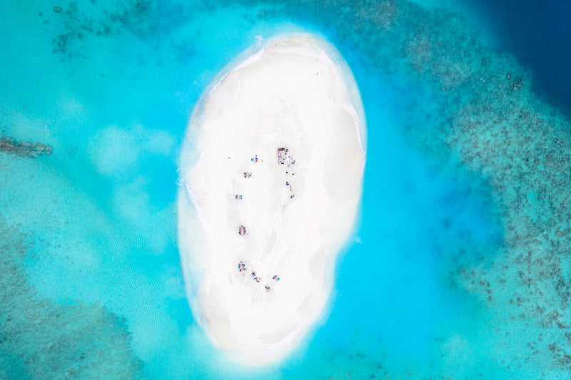 The sandbank at You & Me Maldives from the air.