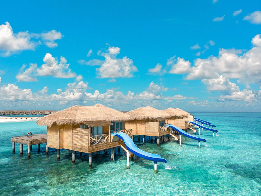 Overwater villas with water slides at You & Me Maldives.