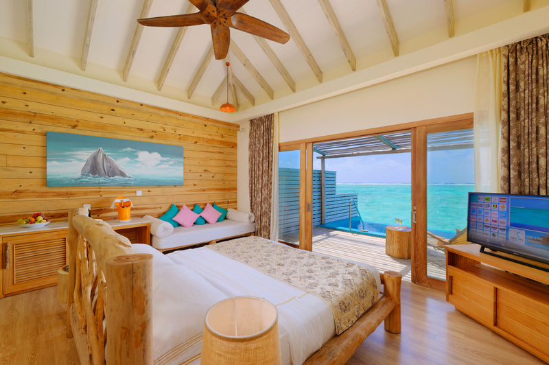 A bedroom with a sea view at You & Me Maldives.
