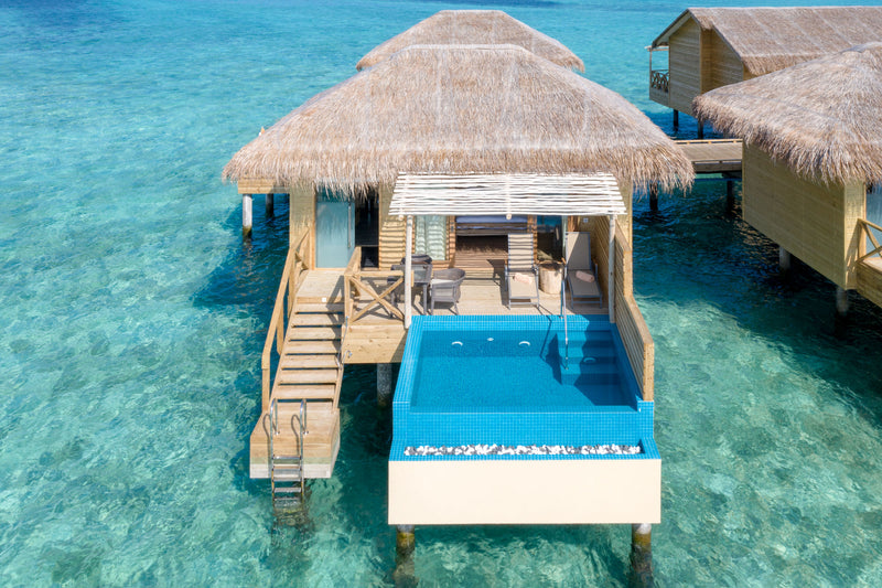 An overwater villa with a pool at You & Me Maldives.