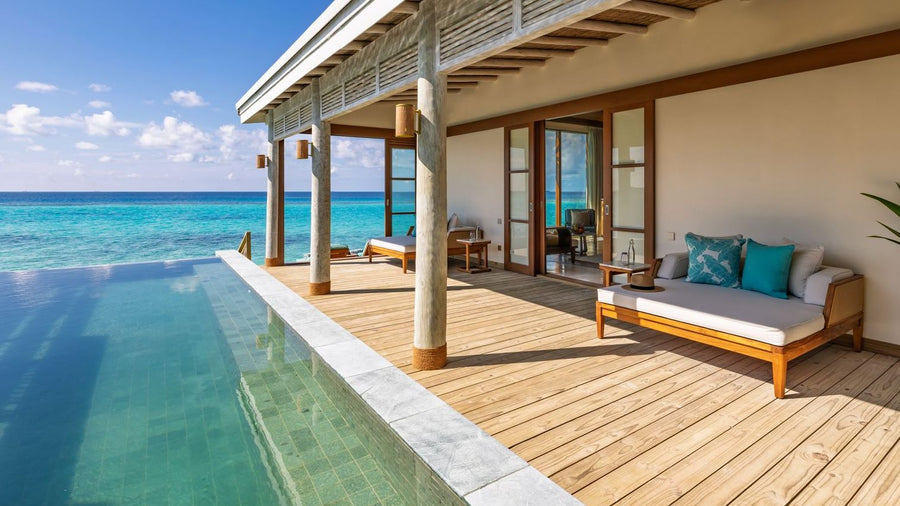The deck and pool of an overwater villa at RAH GILI Maldives.