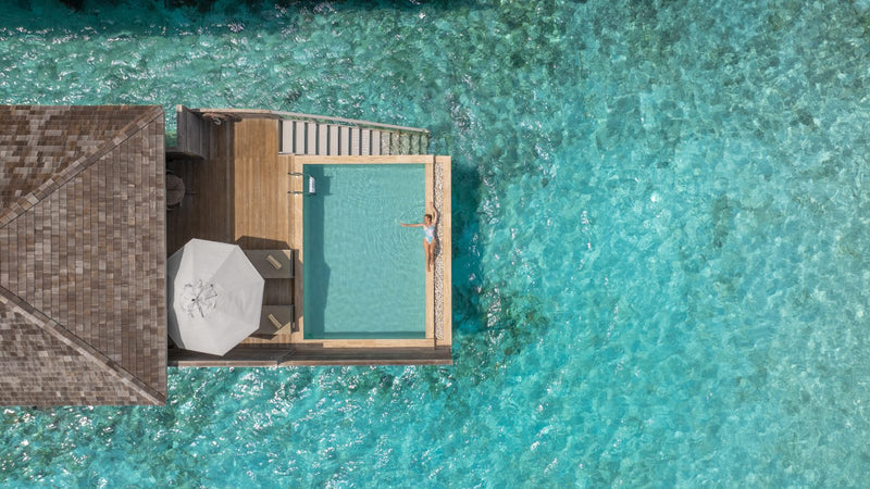 Jawakara Islands Maldives, Lhaviyani Atoll: a Mabin water pool villa from directly above, with its deck pool over the lagoon
