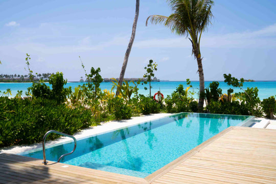 The pool of a beach villa at ananea Madivaru Maldives looking straight out to the lagoon
