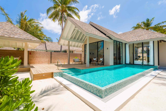 Deluxe Beach Pool Villa at ananea Madivaru Maldives, wide pool wrapping the terrace with the villa opening on to it