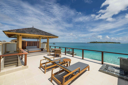 Angsana Velavaru, Dhaalu Atoll — the rooftop terrace of a Deluxe InOcean Pool Villa, with a pavilion and loungers