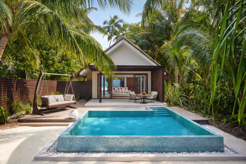 Exterior of a Beach Pool Villa at Niyama Private Islands, with a private pool beside the deck