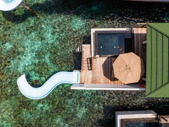 Aerial view of the resort island from the air at Siyam World, Noonu Atoll, Maldives