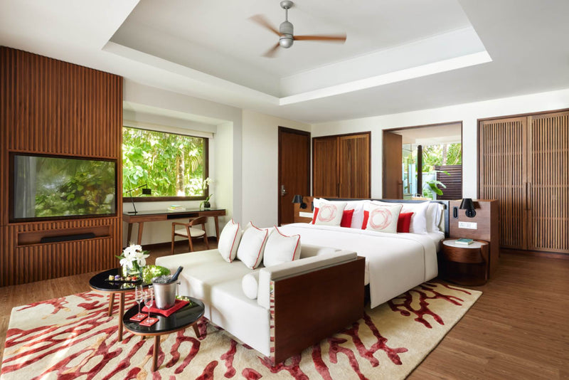 Bedroom of a Deluxe Beach Pool Villa at Niyama Private Islands