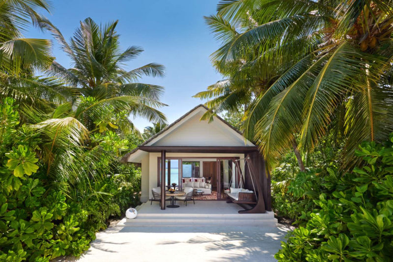 Outdoor living area of a Deluxe Beach Villa at Niyama Private Islands