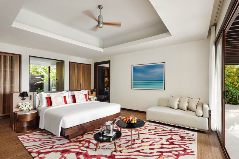 Second view of the master bedroom in a Deluxe Family Beach Pool Villa at Niyama Private Islands