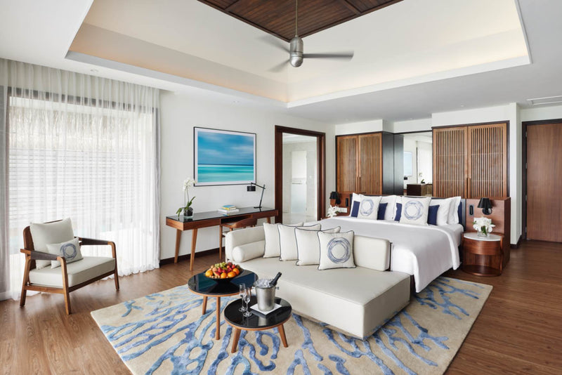 Second view of the bedroom in a Deluxe Over Water Pool Villa at Niyama Private Islands