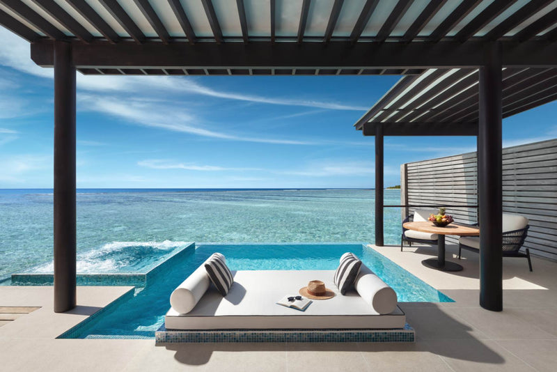 Deck of a Deluxe Over Water Pool Villa at Niyama Private Islands looking out over the Indian Ocean