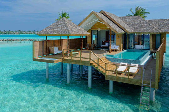 Deluxe Water Pool Villa at ananea Madivaru Maldives, raised overwater villa with an infinity pool above turquoise water