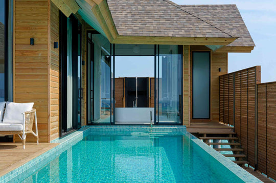 The private pool of an overwater villa at ananea Madivaru Maldives, set into the deck beside the bathroom