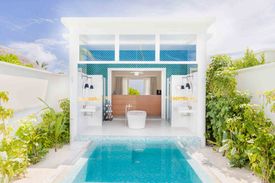 Sun Siyam Iru Veli, Dhaalu Atoll — private pool with an open-air bathroom pavilion at the far end