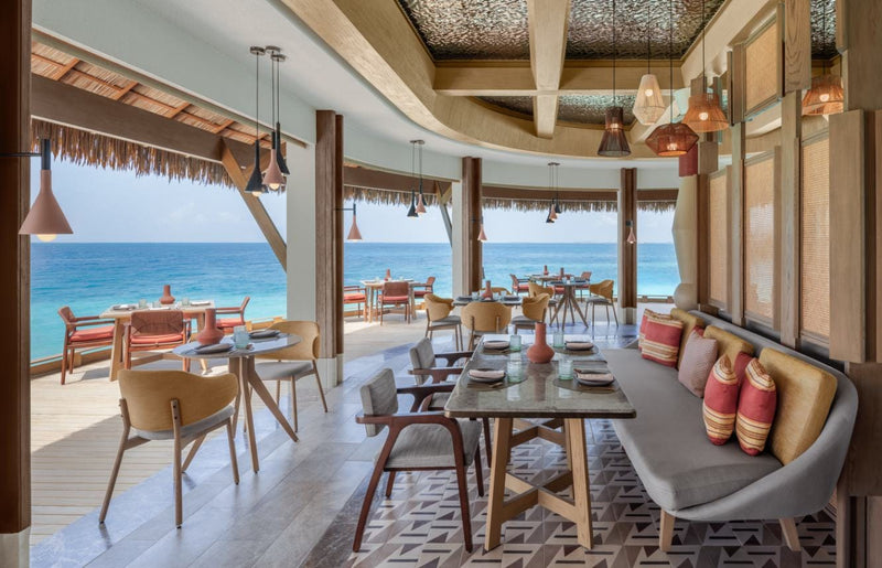The indoor dining room at Athiri restaurant, JW Marriott Maldives Kaafu Atoll