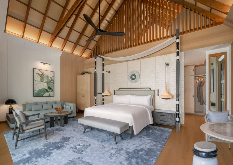Second view of a Beach Pool Villa bedroom at JW Marriott Maldives from the deck looking in