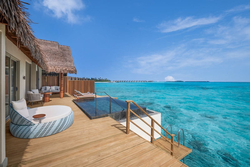 Pool deck of a One Bedroom Overwater Villa above the lagoon at JW Marriott Maldives