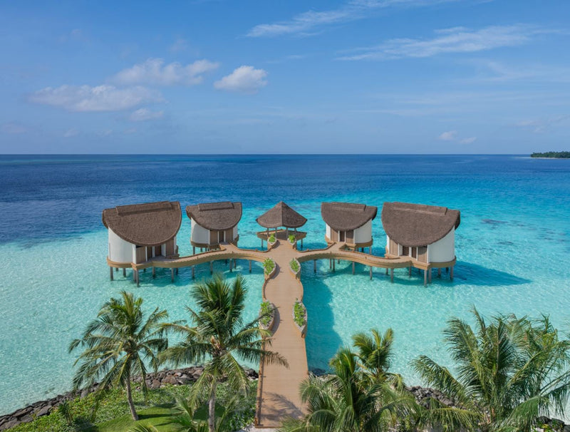 Second aerial view of the overwater spa at JW Marriott Maldives Kaafu Atoll