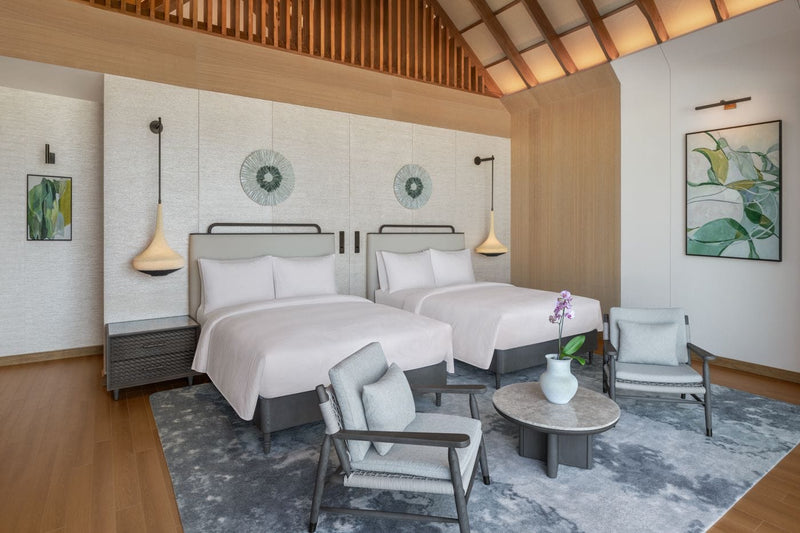 Twin bedroom of a Two Bedroom Beach Villa at JW Marriott Maldives, set up for children