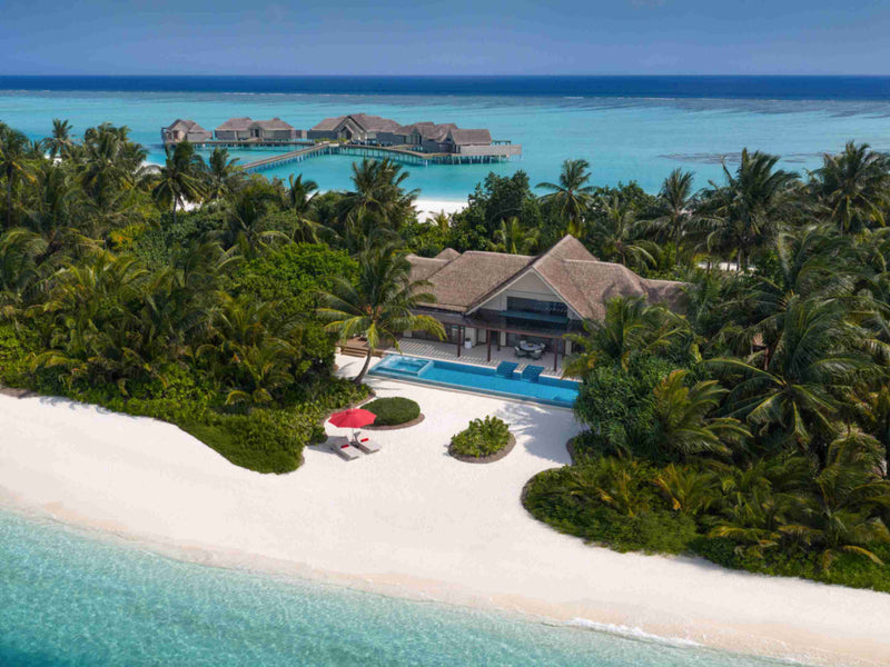 Two Bedroom Beach Pool Pavilion at Niyama Private Islands seen from the air, set behind the beach