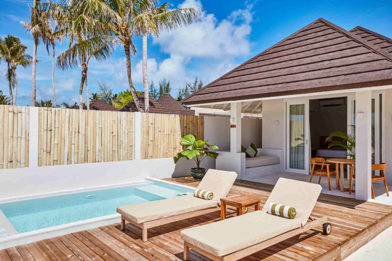 The private pool and timber deck of a Grand Beach Villa with Pool at Sun Siyam Olhuveli.