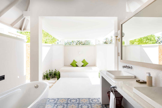 Sun Siyam Olhuveli, South Malé Atoll — bathroom with a bath and an enclosed outdoor shower
