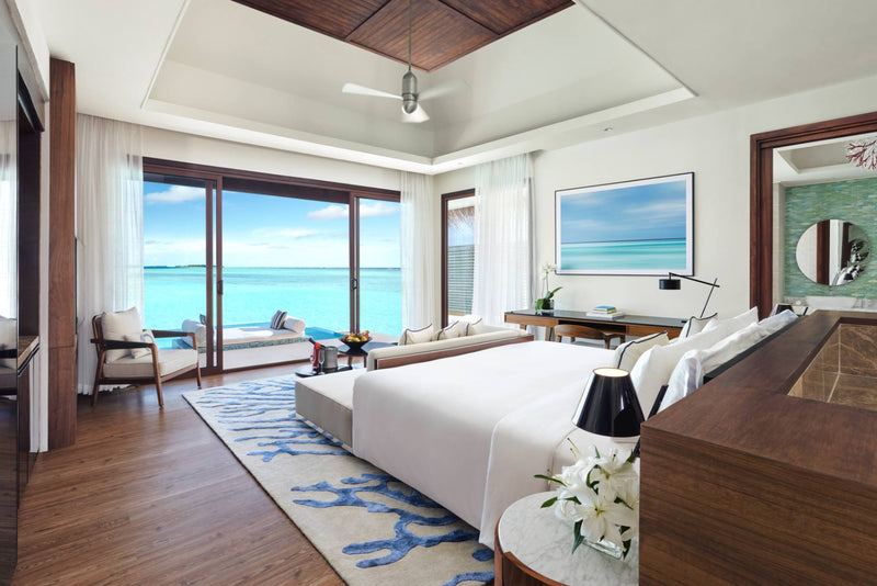 Bedroom of an Over Water Pool Villa at Niyama Private Islands