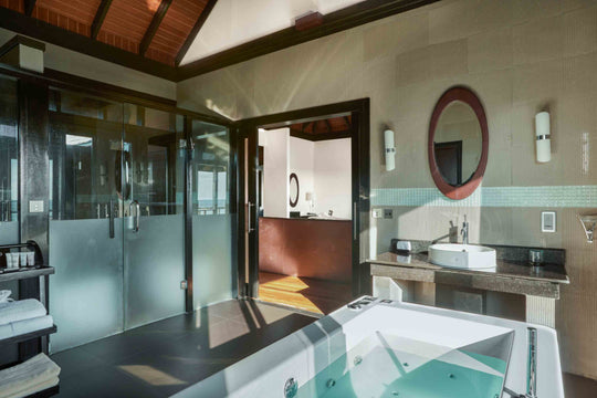 Bathroom of an Aqua Retreat at Sun Siyam Iru Fushi, a two-bedroom retreat