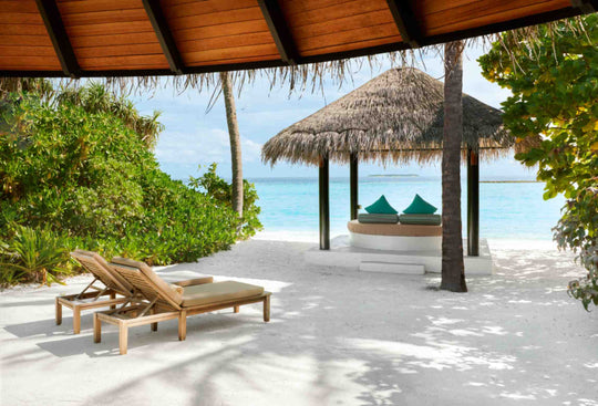 Deluxe Beach Villa at Sun Siyam Iru Fushi from outside, on the sand