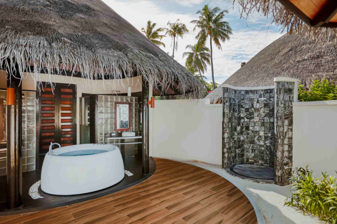 Bathroom of a Deluxe Beach Villa at Sun Siyam Iru Fushi, on the sand