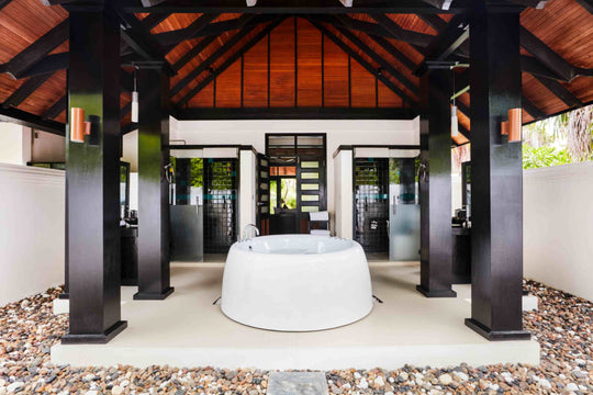 Bathroom of a Hidden Retreat at Sun Siyam Iru Fushi, a two-bedroom retreat