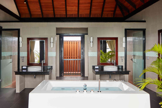 Bathroom of an Infinity Water Villa with Pool at Sun Siyam Iru Fushi, 174 sq m over the lagoon