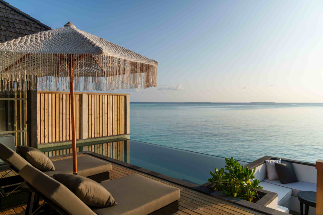 Sunset Horizon Water Villa with Pool at Sun Siyam Iru Fushi from outside, 129 sq m over the lagoon, west facing (2)