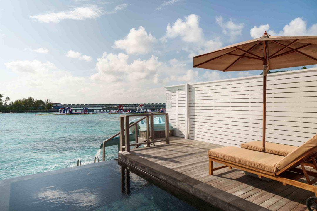 Lagoon Villa with Pool and Slide over the water at Siyam World, Noonu Atoll, Maldives