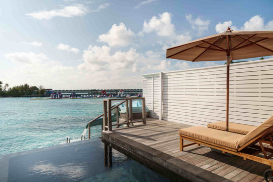 Lagoon Villa with Pool and Slide over the water at Siyam World, Noonu Atoll, Maldives