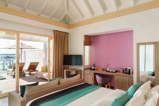 Deck and pool of a Lagoon Villa with Pool and Slide at Siyam World, Noonu Atoll, Maldives