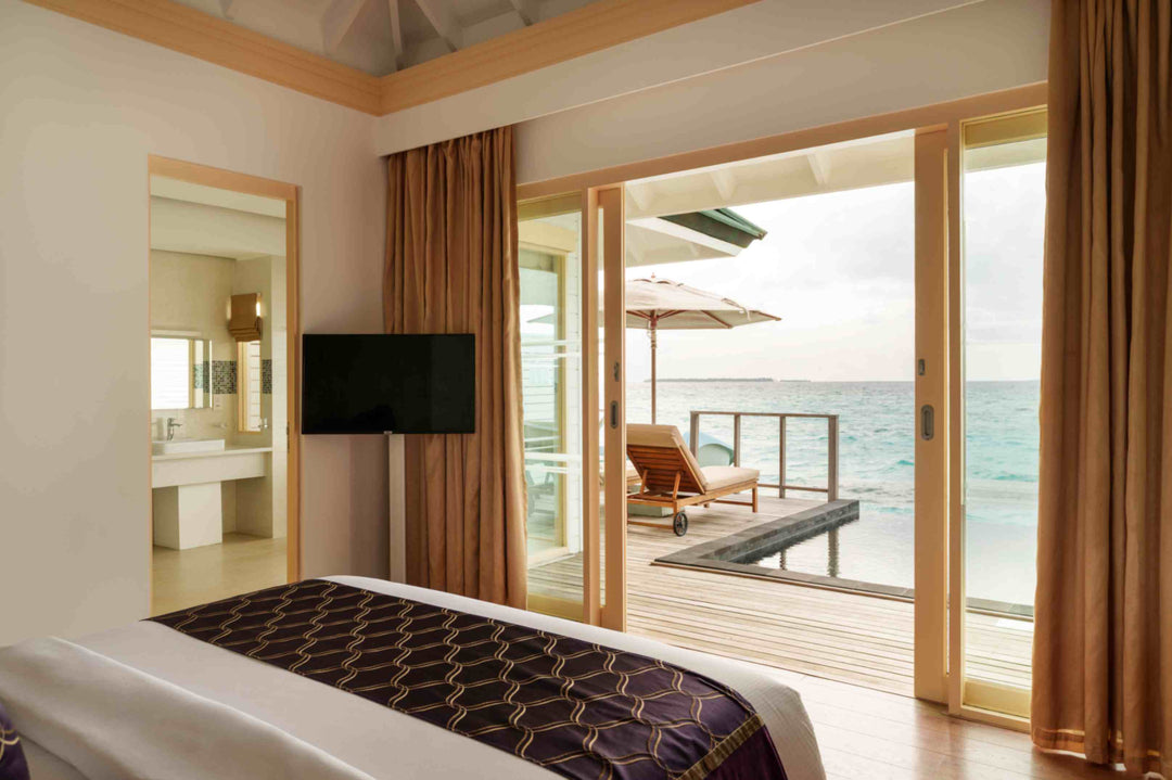 Ocean Villa with Pool and Slide over the lagoon at Siyam World, Noonu Atoll, Maldives