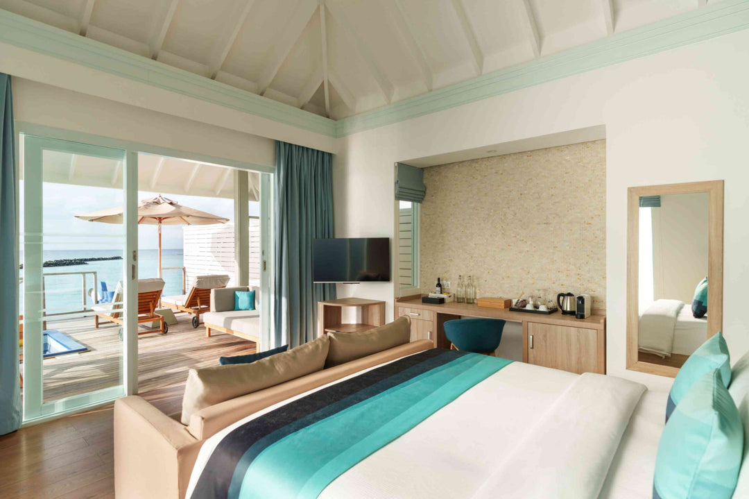 Water Villa with Pool and Slide, the entry overwater category at Siyam World, Noonu Atoll, Maldives