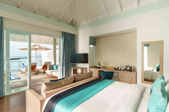 Water Villa with Pool and Slide, the entry overwater category at Siyam World, Noonu Atoll, Maldives