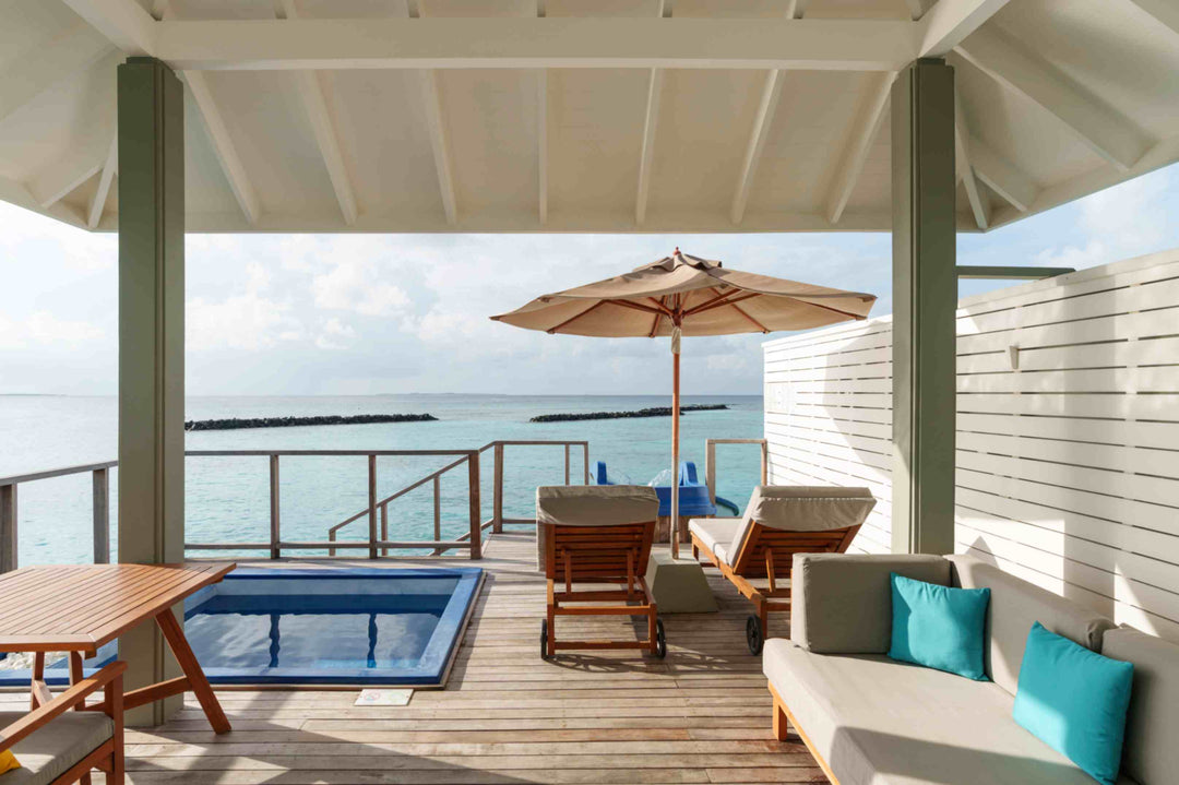 Water Villa with Pool and Slide, private pool and slide into the lagoon at Siyam World, Noonu Atoll, Maldives