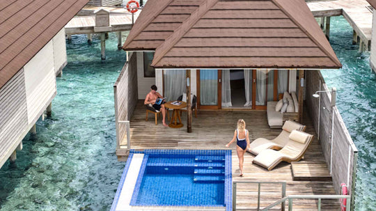 Romantic Water Villa with Pool with steps into the lagoon at Sun Siyam Romance, Maldives