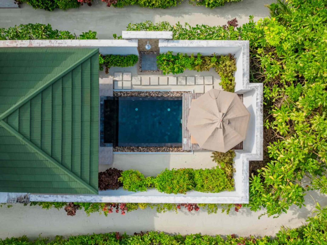 Aerial view of a villa and its upgraded private pool at Siyam World, Noonu Atoll, Maldives