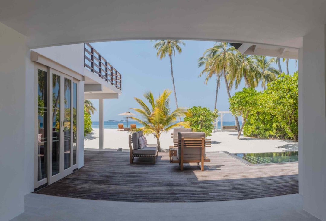 Villa bedroom looking out to the sea at Siyam World, Noonu Atoll, Maldives